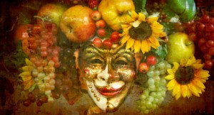 Karnevalsmaske und Obst